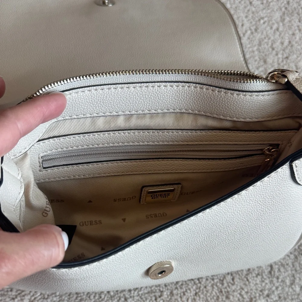 GUESS Cream Pebbled Leather Crossbody with Gold Triangle Logo